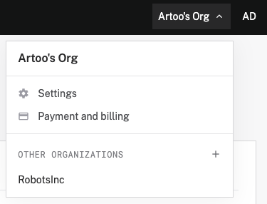 The org dropdown showing an example user's name, email, Sign out button, list of organizations, and org settings button.